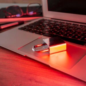 Laptop with padlock. Safe laptop. Protected information from hackerrus. Passwords to protect data Laptop with padlock. Safe laptop. Protected information from hackerrus. Passwords to protect data