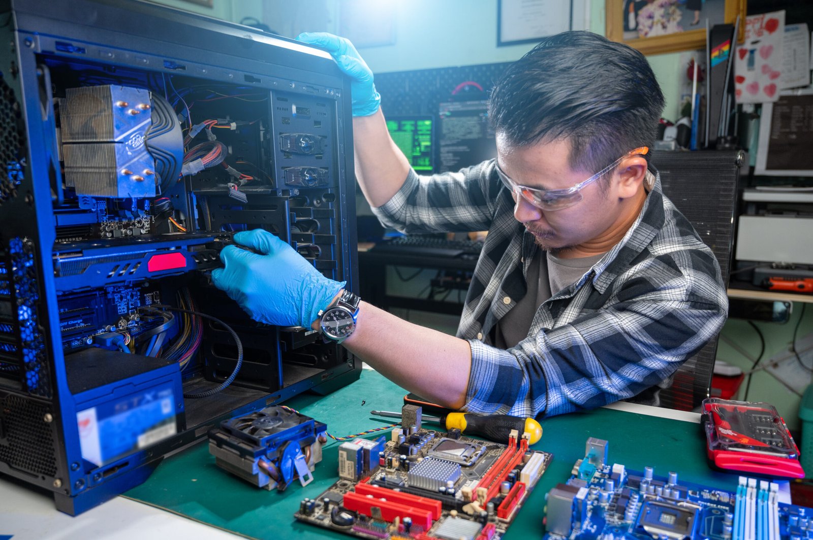 The technician repairing the computer. the concept of computer, CPU, motherboard, hardware, repairing, upgrade and technology.